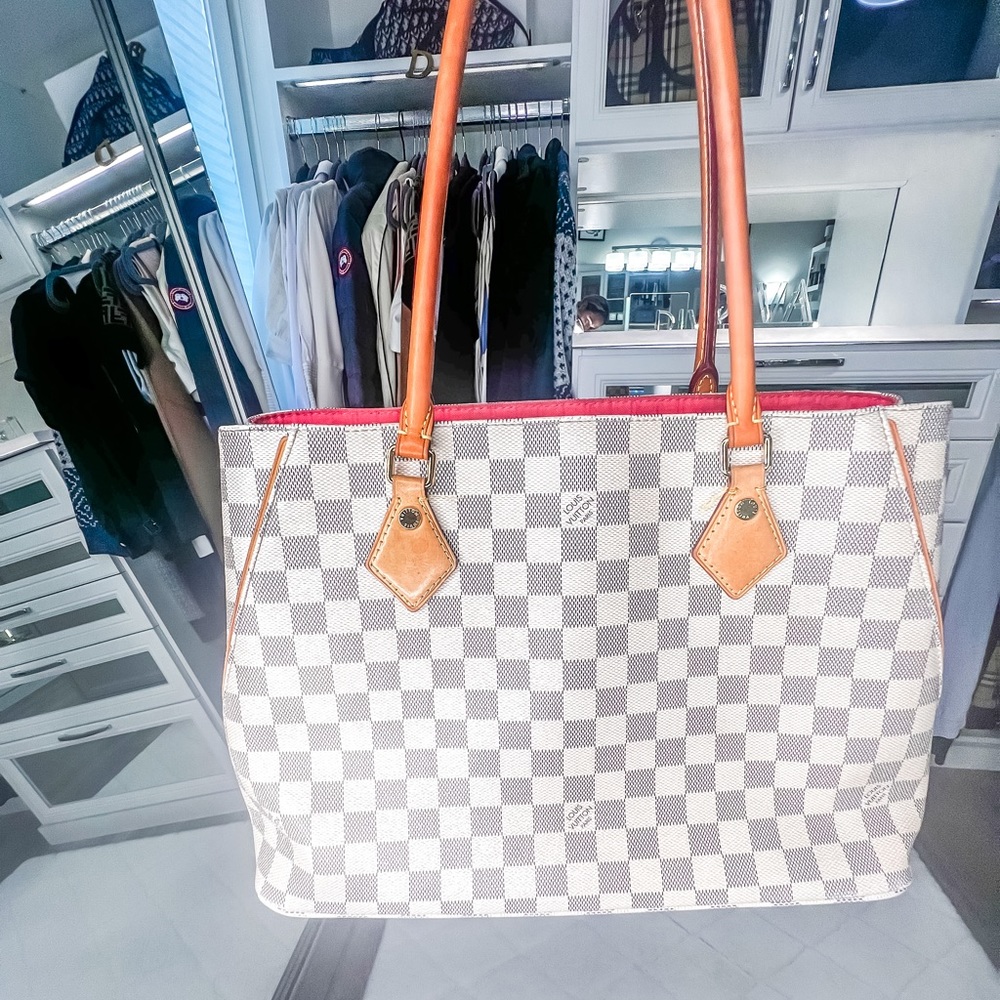 Versatile Louis Vuitton bag!!  Good condition..
